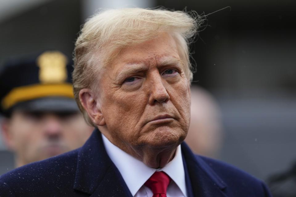 Former President Donald Trump listens during a news conference after attending the wake of New York City police officer Jonathan Diller, Thursday, March 28, 2024, in Massapequa Park, N.Y. Diller was shot and killed Monday during a traffic stop, the city's mayor said. It marked the first slaying of an NYPD officer in two years. (AP Photo/Frank Franklin II)