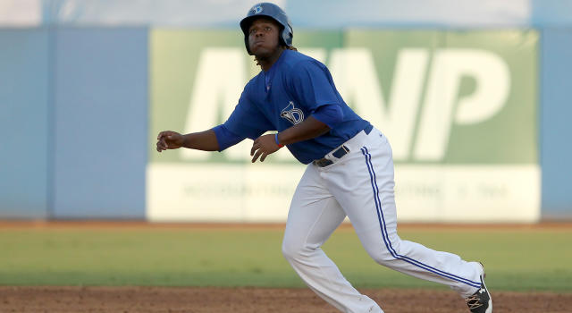 Vladdy Guerrero stamps hillside with his No. 27