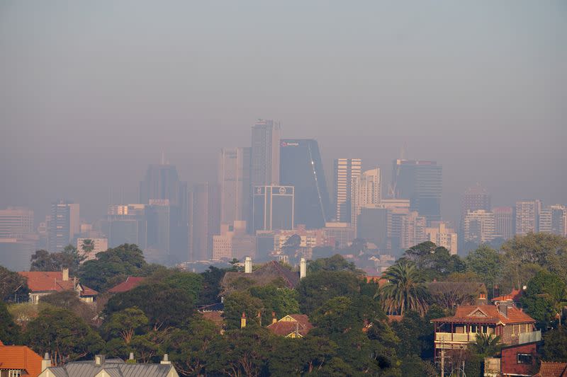 FILE PHOTO: Smoke shrouds the skyline of Sydney