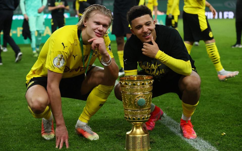 Erling Haaland and Jadon Sancho celebrate winning the DFB Cup - REUTERS