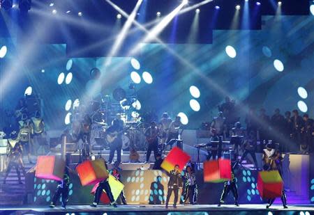 Indian singer and composer A.R. Rahman performs in a concert organized by Bangladesh Cricket Board (BCB) ahead of ICC World Twenty20 cricket tournament in Dhaka March 13, 2014. REUTERS/Andrew Biraj