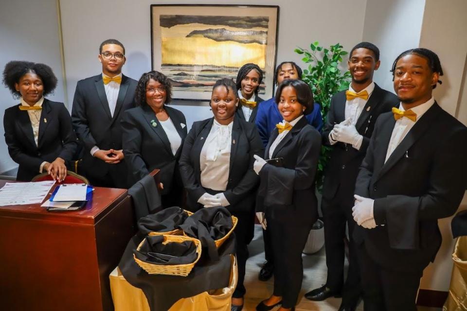 Front-of-house students, alongside Ruth Smith, department chair and associate professor of hospitality management, during the reopening of Bethune-Cookman University's Cub Paradise Restaurant.