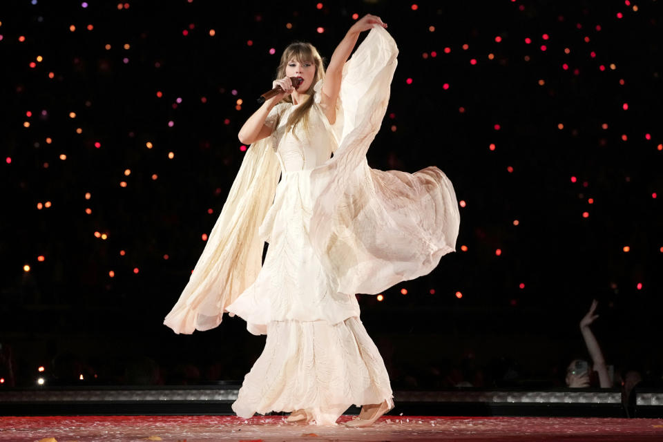 <p>During night two, Swift wore another Alberta Ferretti dress, this time in an off-white hue covered in crystal embroidery. The gown's flowing, cape-like sleeves were made for twirling. </p>