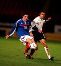 France's Jeremy Toulalan (l) holds off England's Jermaine Jenas (r) (Photo by John Marsh/EMPICS via Getty Images)