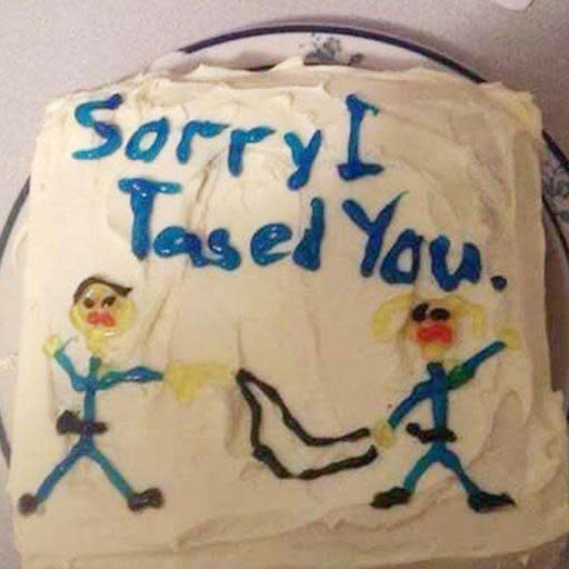 This photo released by Alistair McKenzie shows the cake received by his client Stephanie Byron.  Byron's lawsuit says a deputy shot her with a stun gun, then apologized with a cake that said, "Sorry I Tased You" in blue frosting. The lawsuit, filed in federal court in Pensacola, Fla., alleges former Escambia County sheriff's deputy Michael Wohlers violated Byron's civil rights, committed battery against her and caused her hardships, including physical injuries, monetary loss, medical expenses, humiliation and mental anguish. (Courtesy of  Alistair McKenzie via AP)