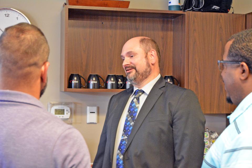 Martin Gugel, finalist for Columbia Public Works director, chats with the public Thursday during a meet-and-greet event at The Hub, Regional Economic Development Inc.'s entrepreneurial center.