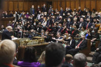 FILE - In this photo provided by UK Parliament, Britain's Prime Minister Boris Johnson speaks as members of the opposition party gesture, during Prime Minister's Questions in the House of Commons, in London, Jan. 12, 2022. Some Conservative lawmakers in Britain are talking about ousting Johnson, who has been tarnished by allegations that he and his staff held lockdown-breaching parties during the coronavirus pandemic. The party has a complex process for changing leaders that starts by lawmakers writing letters to demand a no-confidence vote. (UK Parliament/Jessica Taylor via AP, File)