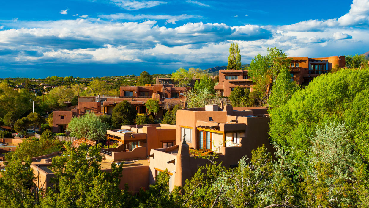 Hillside houses and trees in Santa Fe, New Mexico