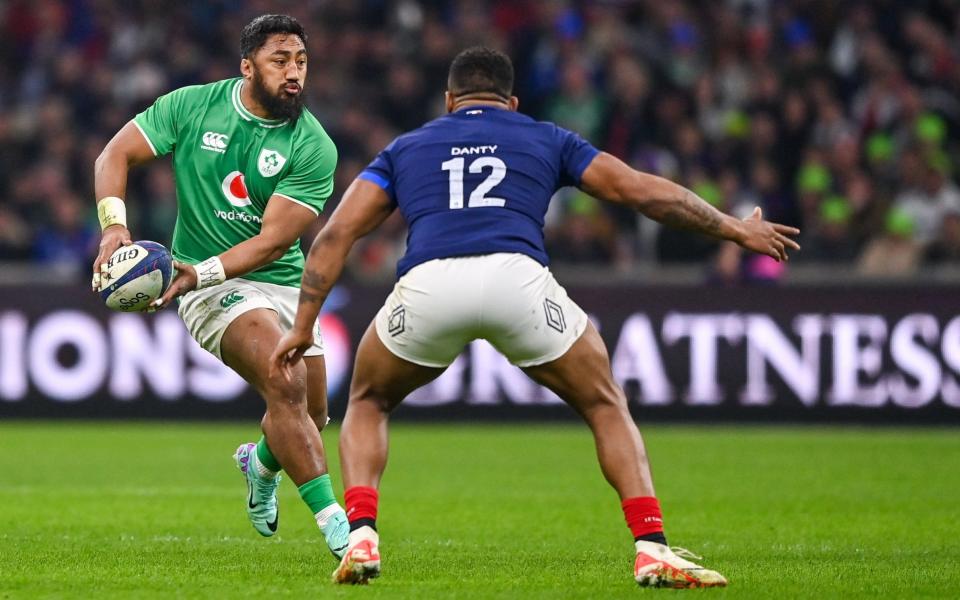 Bundee Aki of Ireland in action against Jonathan Danty of France during the Guinness Six Nations Rugby Championship match between France and Ireland at the Stade Velodrome in Marseille, France