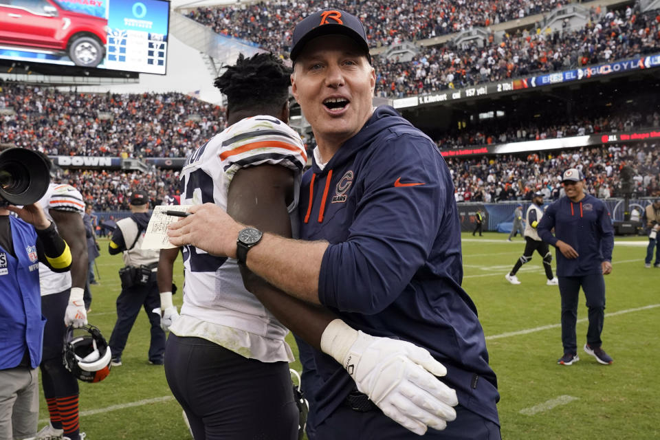 Chicago Bears coach Matt Eberflus, right, celebrates with Nicholas Morrow (53) after an NFL football game against the Houston Texans Sunday, Sept. 25, 2022, in Chicago. The Bears won 23-20. (AP Photo/Nam Y. Huh)