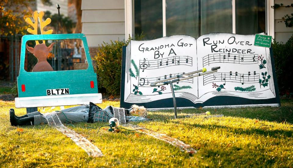 A whimsical display for the Christmas song “Grandma Got Run Over By A Reindeer” is part of the annual presentation of themed decorations at Christmas Carol Lane in Kennewick.