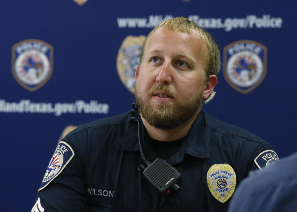 Sgt. Michael Wilson, of the Midland, Texas Police Department, talks about his role in pursuing the suspect in Saturday's shooting incident during an interview Tuesday, Sept. 3, 2019, in Odessa, Texas. Wilson said that the department had been short handed over the weekend. (AP Photo/Sue Ogrocki)