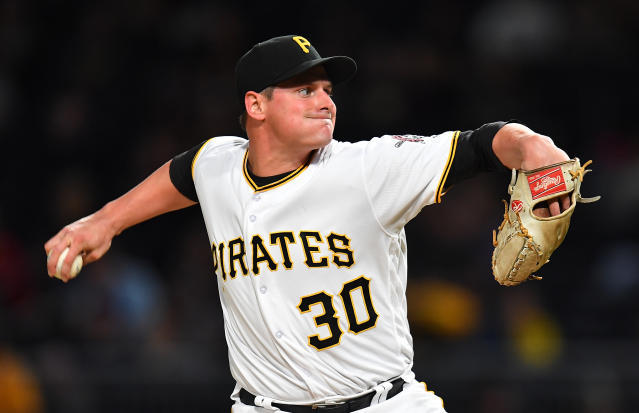 Pittsburgh Pirates relief pitcher Felipe Vazquez, right, and