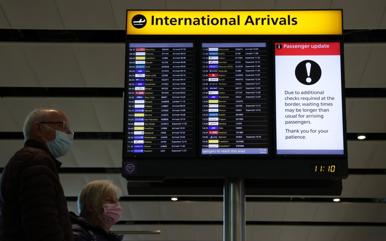 International arrival times displayed at Heathrow Terminal 2 - Hollie Adams/Getty Images