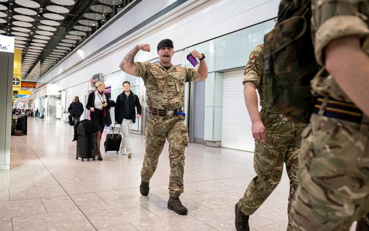 Army personnel on their way to staff border control at Heathrow during the strikes - Tony Kershaw/SWNS