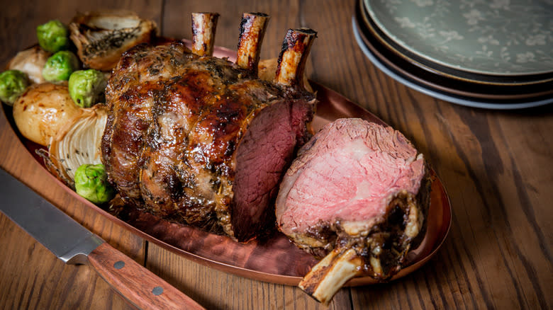 Prime rib roast on serving platter