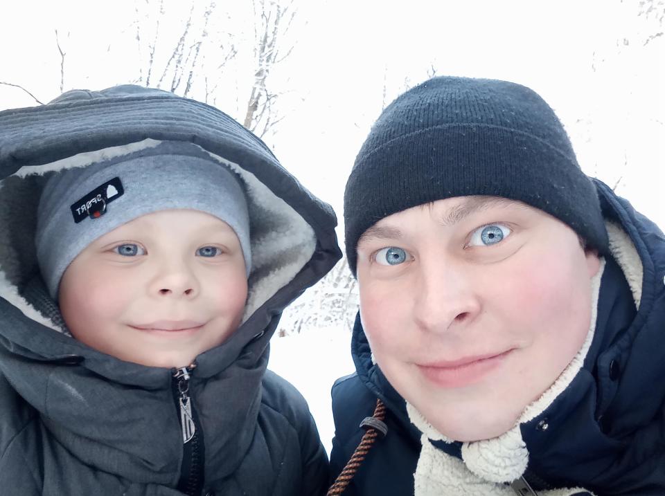 Savely Zolotukhin, 9, with his father. Source: east2west/Australscope