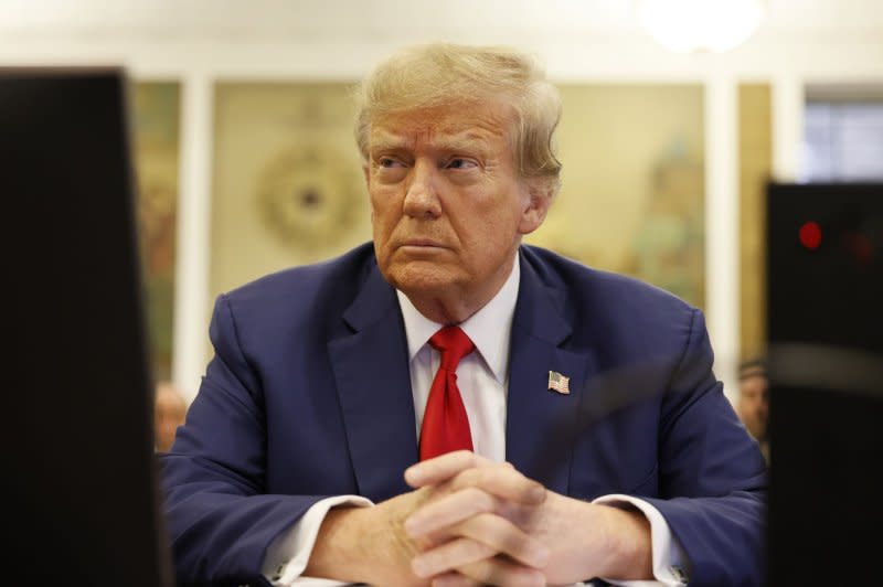 Former President Donald Trump sits in New York State Supreme Court during his civil fraud trial Thursday in New York City. Pool Photo by Michael M. Santiago/UPI
