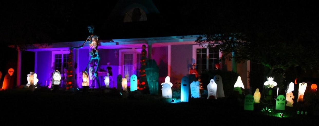 The Kokindas home at 2768 Sand Road, Port Clinton, has a colorful Halloween display with dozens of "blow mold" decorations.