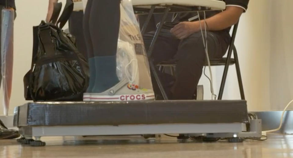 A passenger is standing on a scale being weighed, much like many Air New Zealand passengers will be during June.