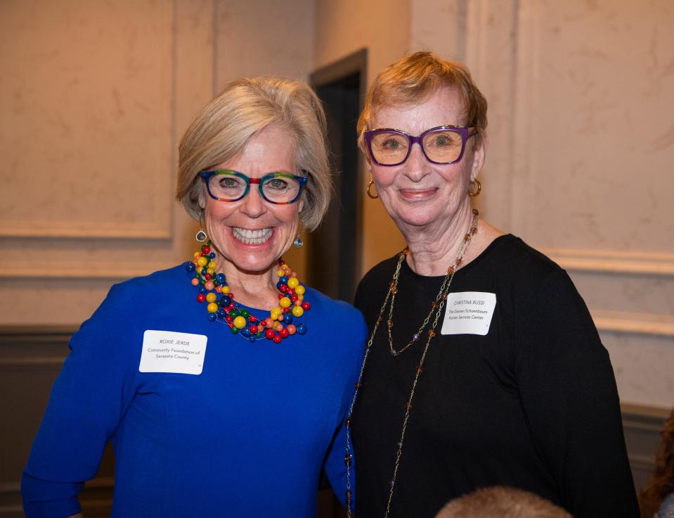 Roxie Jerde, CEO of the Community Foundation of Sarasota County, left, and Christina Russi, community fiscal agent and liaison for 211 and Season of Sharing.