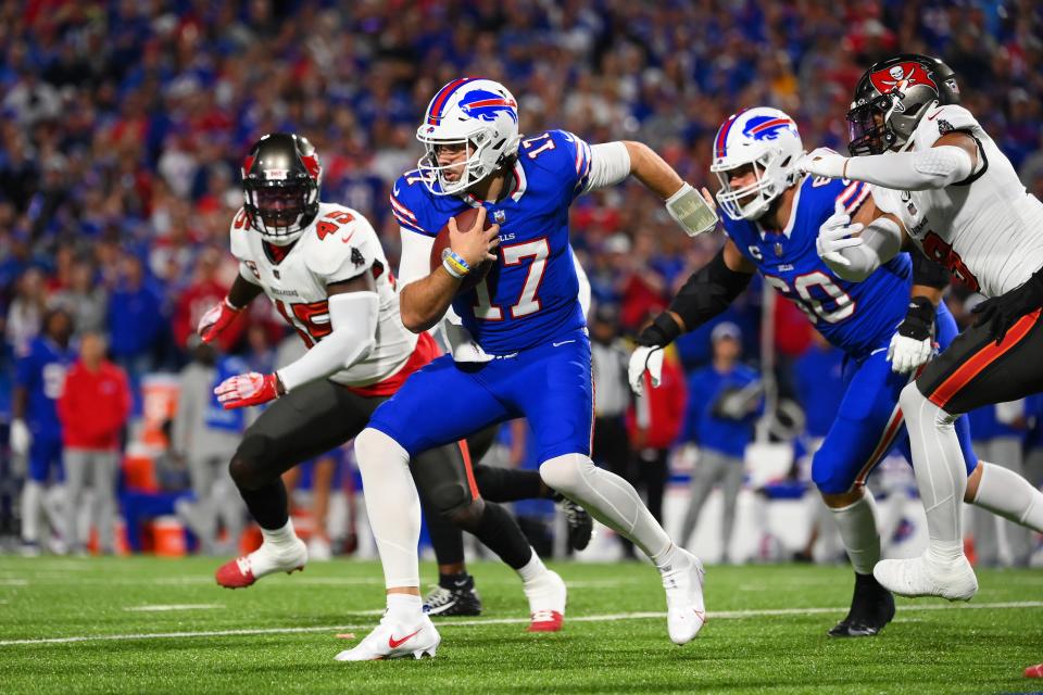 ORCHARD PARK, NEW YORK - OCTOBER 26: Josh Allen #17 of the Buffalo Bills carries the ball against the Tampa Bay Buccaneers during the first quarter at Highmark Stadium on October 26, 2023 in Orchard Park, New York. (Photo by Rich Barnes/Getty Images)