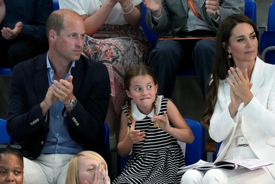 Princess Charlotte takes in the atmosphere at the swimming (Jacob King/PA) (acob King/PA)