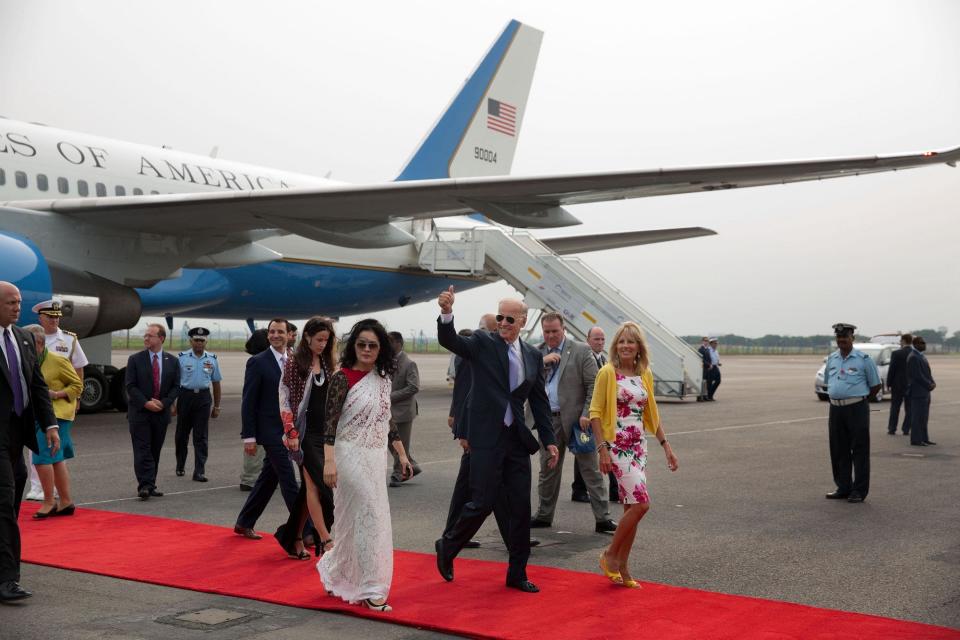 Vice President Joe Biden and Dr. Jill Biden wave as they arrive at Indira Gandhi International Airport, in New Delhi, India. July 22,&nbsp;2013.