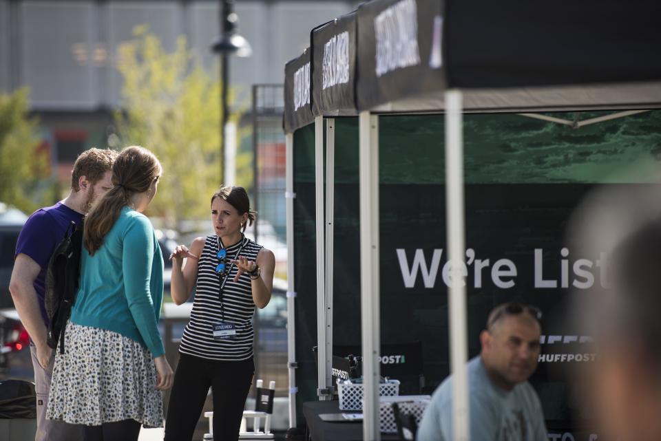 Emma Reilly of HuffPost (center) talks to Jennifer Castle and Lee Hawks.