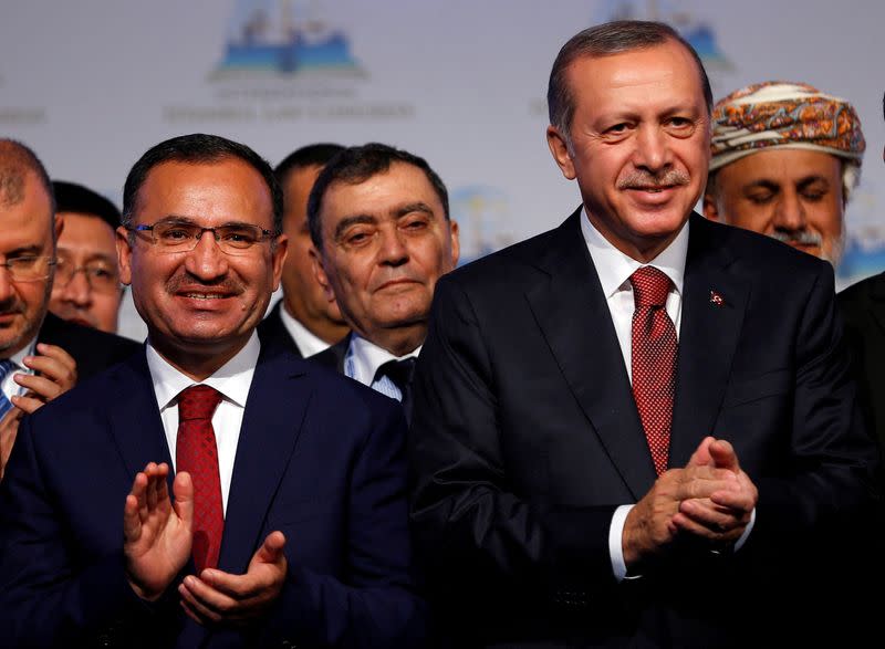 FILE PHOTO: Turkish President Erdogan is pictured with Turkish Justice Minister Bozdag during the International Istanbul Law Congress in Istanbul