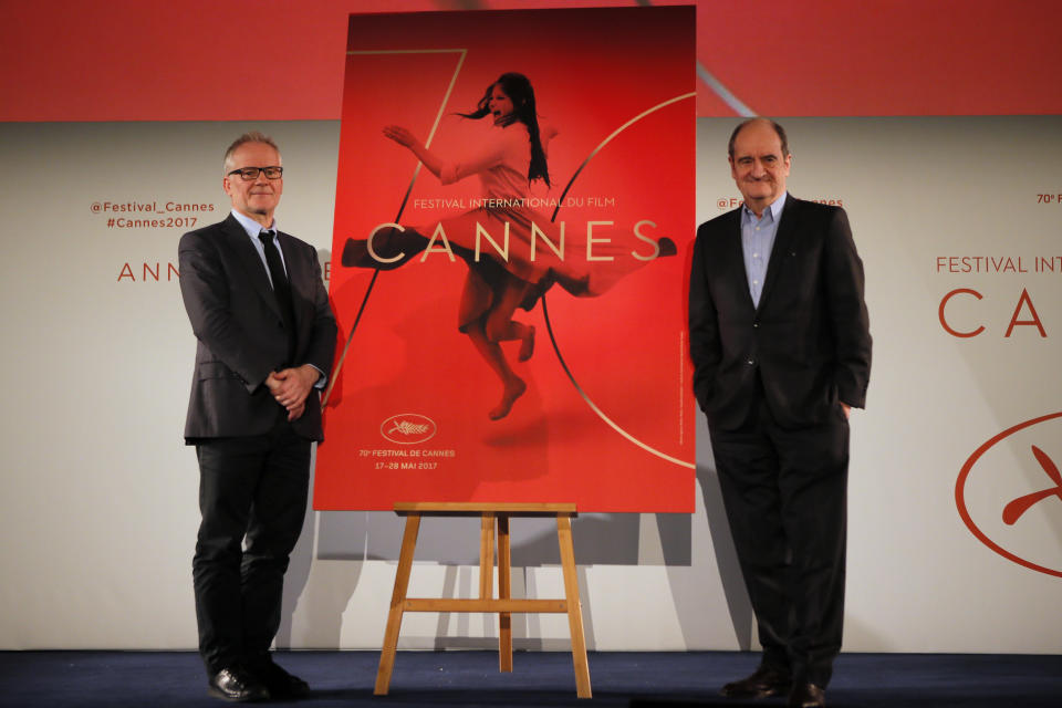 General Delegate of the Cannes Film Festival Thierry Fremaux, left and Cannes Film Festival President Pierre Lescure pose during a press conference for the presentation of the 70th Cannes film festival, in Paris, Thursday, April 13, 2017. A Civil War film by Sofia Coppola, a Ukrainian road movie and a film about AIDS activism are among 18 films competing for the top prizes at this year's Cannes Film Festival, which organizers hope can help counter nationalist sentiment. (AP Photo/Francois Mori)