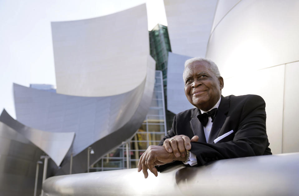 Horace Bowers, 93, owner of Bowers & Sons Cleaners in Los Angeles and a subject of the Oscar-nominated documentary short film "A Concerto is a Conversation," poses for a portrait outside Walt Disney Concert Hall, Thursday, April 15, 2021, in Los Angeles. (AP Photo/Chris Pizzello)