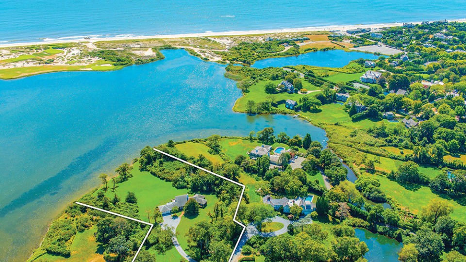 An aerial view of Hook Pond in East Hampton, N.Y., where the house in the center recently went for $21.75 million.