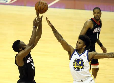 May 16, 2018; Houston, TX, USA; Houston Rockets guard James Harden (13) shoots against Golden State Warriors guard Nick Young (6) during the second half in game two of the Western conference finals of the 2018 NBA Playoffs at Toyota Center. Mandatory Credit: Troy Taormina-USA TODAY Sports