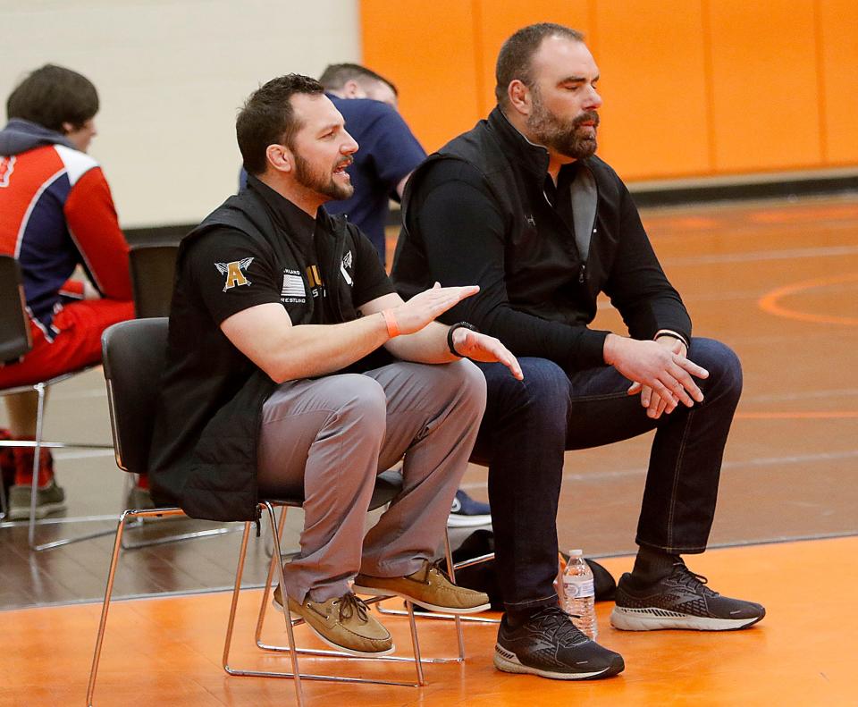 Ashland High School's head coach Sean Seder, left, and coach Clell Cox are seen during one of the matches during the JC Gorman Invitational Saturday, Jan. 8, 2022 Mansfield Senior High School. TOM E. PUSKAR/TIMES-GAZETTE.COM