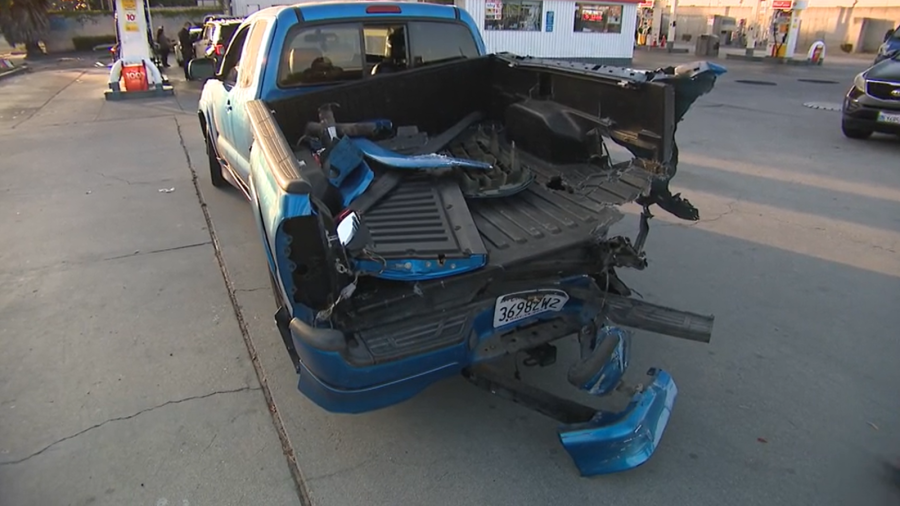 A violent hit-and-run crash involving two trucks caused heavy damage to a gas station car wash in Harbor Gateway on July 16, 2024. (KTLA)