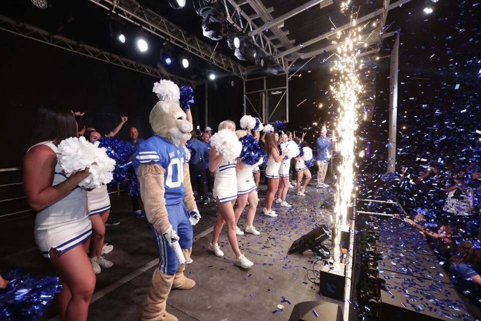 BYU cheerleaders and Cosmo gather with fans in the wee hours Saturday morning to celebrate the Cougars officially becoming members of the Big 12 Conference. | BYU Photo