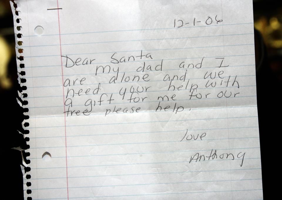 A sample of a letter received by the United States Postal Service is put on display at a news conference at the James A. Farley Post Office in New York on Dec. 4, 2006 to kick off "Operation Santa Claus". The program was created for the public to come into the post office and help answer some of the thousands of "Dear Santa" letters that arrive every day.