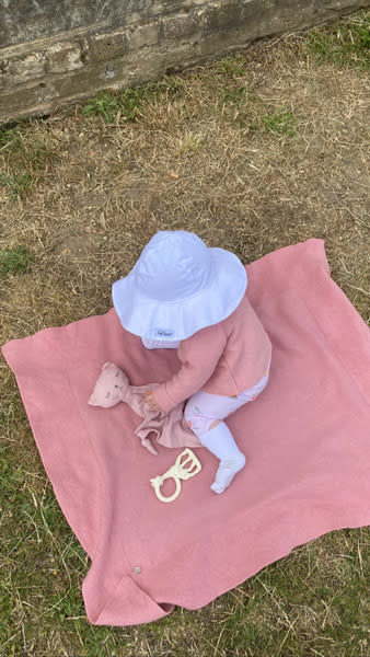 alex-jones-baby-annie-enjoying-the-sunshine-all-pink-ensemble