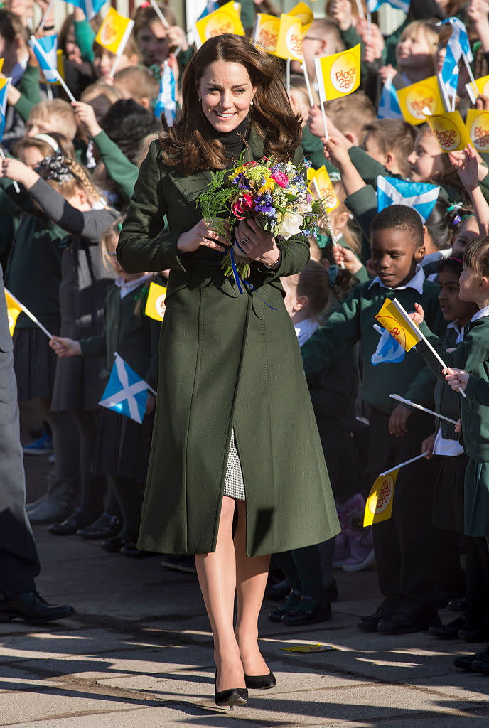 Back in February 2016, the Duchess of Cambridge donned an emerald green Sportmax coat to greet pupils at St Catherine’ Primary School in Edinburgh [Photo: Getty]