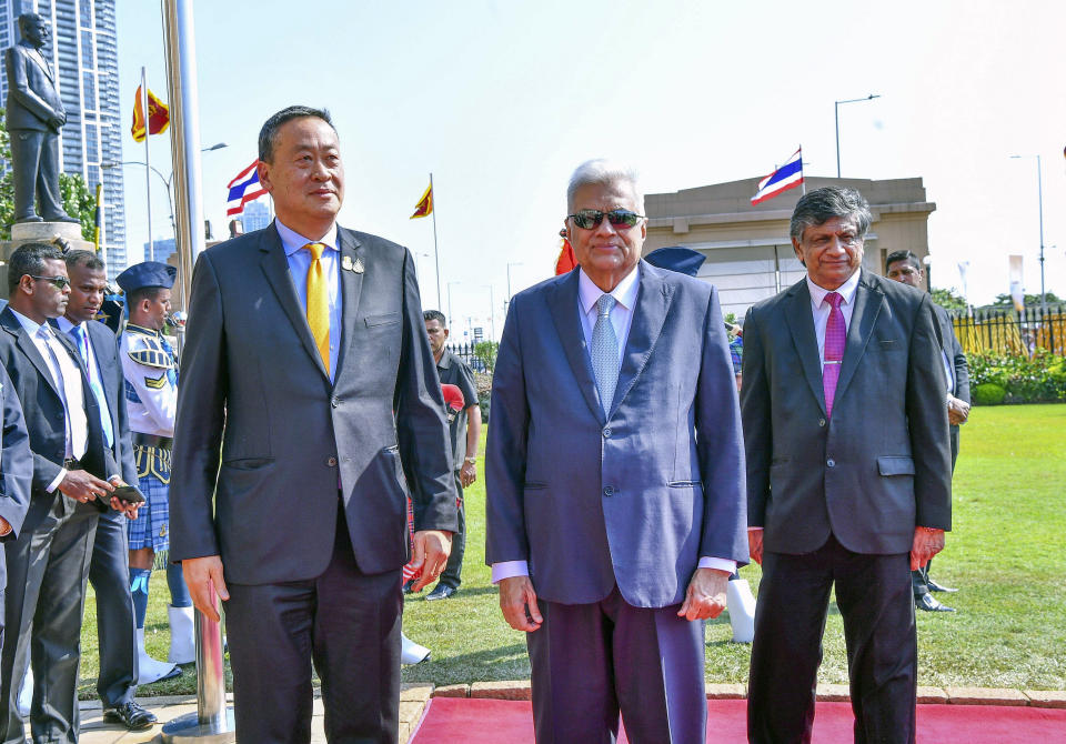 In this Handout photograph released by the Sri Lanka President's Office HO, Sri Lankan President Ranil Wickremesinghe, second right, poses for a photograph with Thai Prime Minister Srettha Thavisin at the presidential secretariat in Colombo, Sri Lanka, Saturday, Feb. 3, 2024. (Sri Lanka President's Office HO via AP)