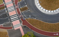 The UK's first Dutch-style roundabout � which prioritises cyclists and pedestrians over motorists � has opened in Fendon Road, Cambridge. The cost of the scheme, originally estimated at around GBP 800,000, has almost trebled to GBP 2.3m at the end of the project.