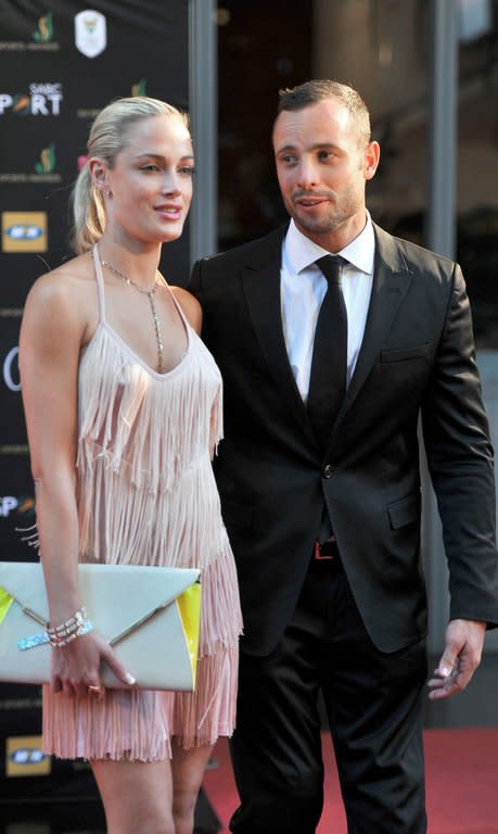 Oscar Pistorius and his model girlfriend Reeva Steenkamp on November 4, 2012 in Johannesburg. Steenkamp, 29, was shot four times in the early hours of Thursday by a 9mm pistol owned by the sprinter