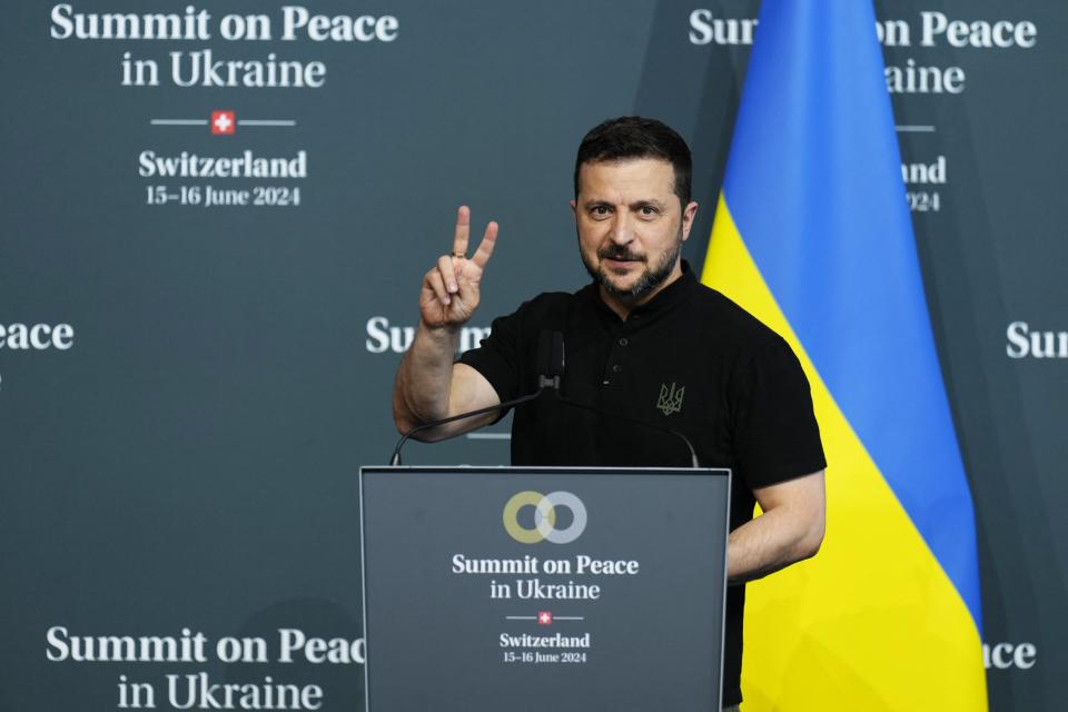 Ukraine’s President Volodymyr Zelensky flashes a V sign as he addresses Ukraine’s closing press conference of the Summit on peace in Ukraine, at the luxury Burgenstock resort, near Lucerne, Switzerland (AFP via Getty Images)