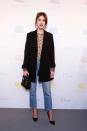 <p>Alexa Chung was cool and casual in a sheer floral top, jeans, black jacket and black pumps. </p>