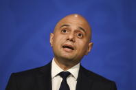 Britain's Health Secretary Sajid Javid speaks during a media briefing in Downing Street, London, Wednesday, Oct. 20, 2021. The U.K. recorded almost 50,000 new infections in a single day this week, and cases have risen 16% from a week earlier. Matthew Taylor, chief executive of health care umbrella group the NHS Confederation, said the health system risks being overwhelmed unless measures are introduced now. (Toby Melville/Pool Photo via AP)