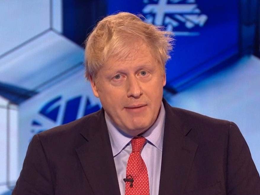 Boris Johnson replying to a member of the public in the audience during his head to head debate with Jeremy Corbyn: BBC/PA Wire