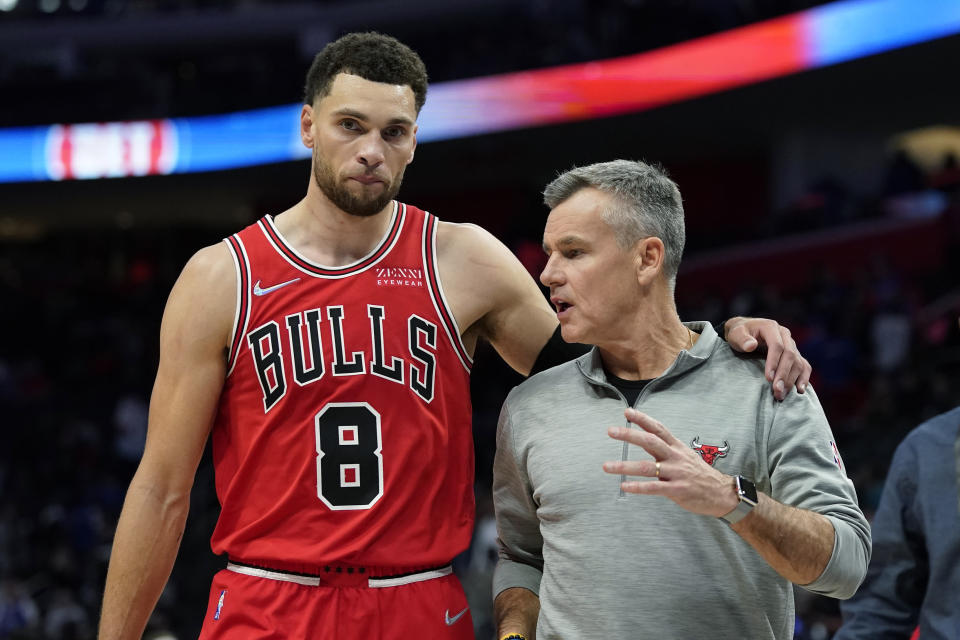 Chicago Bulls guard Zach LaVine (8) walks off the court with head coach Billy Donovan after the second half of an NBA basketball game against the Detroit Pistons, Wednesday, Oct. 20, 2021, in Detroit. (AP Photo/Carlos Osorio)