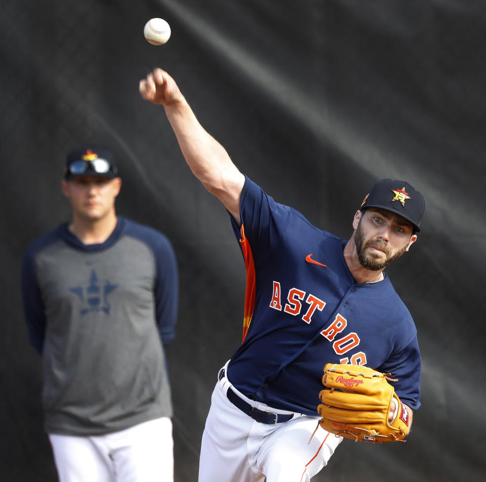 Houston Astros pitcher Austin Pruitt (51) warms up before pitching live batting practice during baseball spring training Wednesday, Feb. 19, 2020, in West Palm Beach, Fla. (Karen Warren/Houston Chronicle via AP)