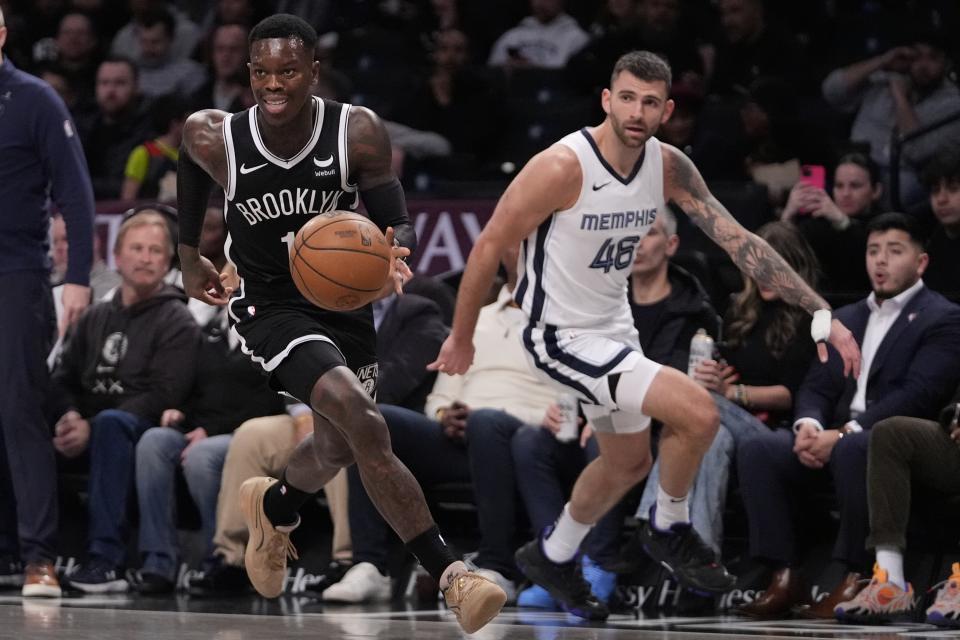Brooklyn Nets' Dennis Schroder drives past Memphis Grizzlies' John Konchar (46) during the first half of an NBA basketball game Monday, March 4, 2024, in New York. (AP Photo/Frank Franklin II)